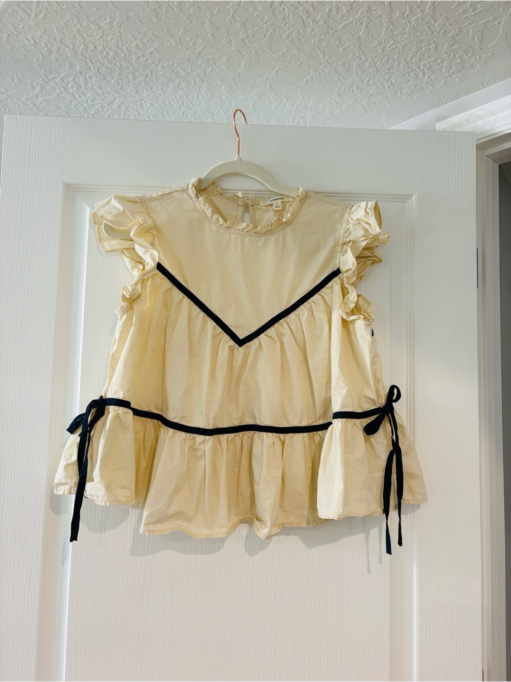 Lalavon Cream Ruffle Peplum Top with Navy Trim